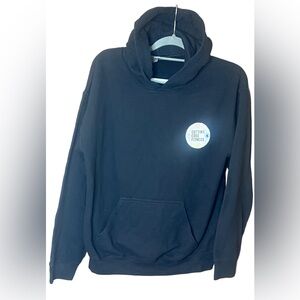 Black hoodie. Fitness vibe. Size medium.